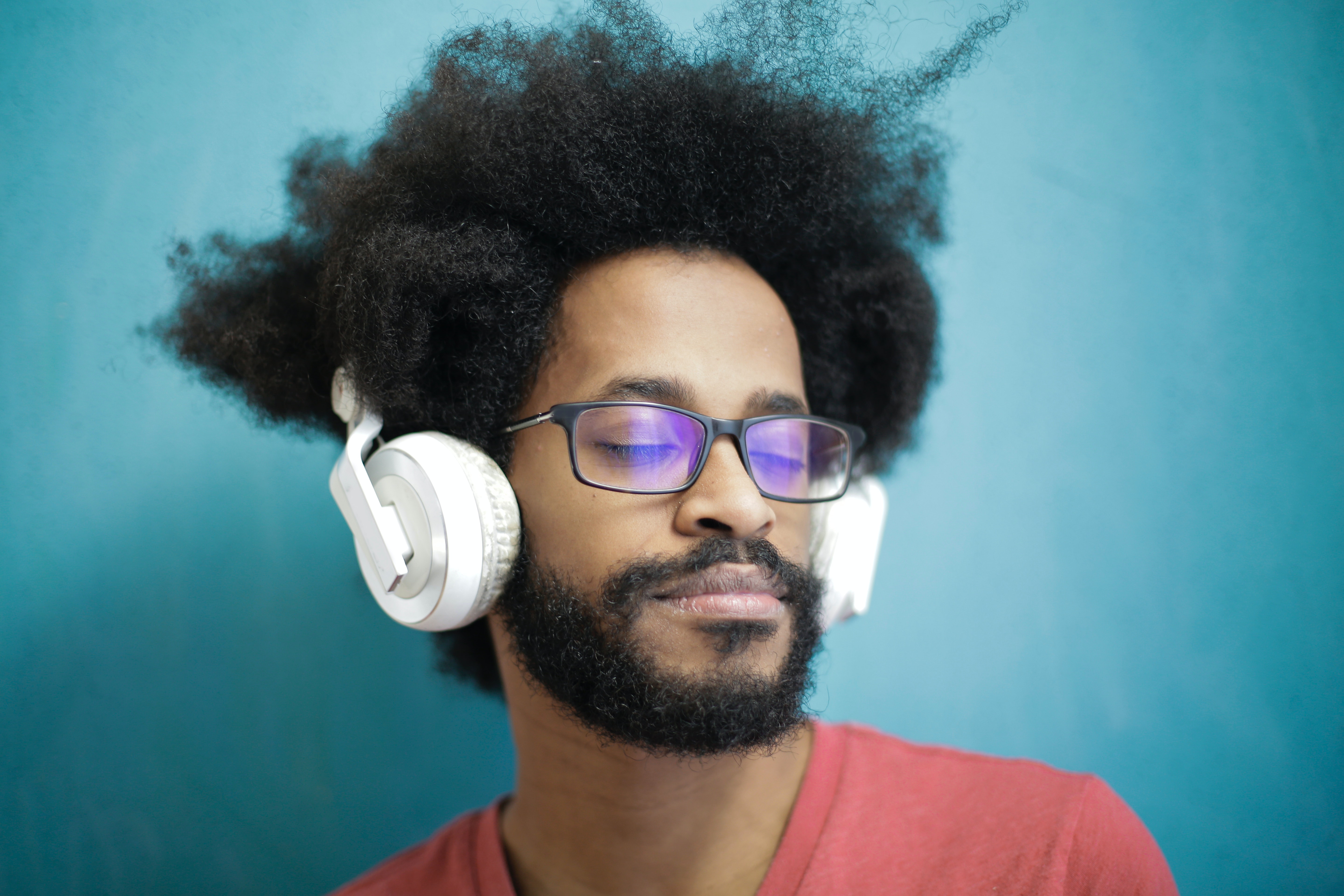 Image of a person listening to music