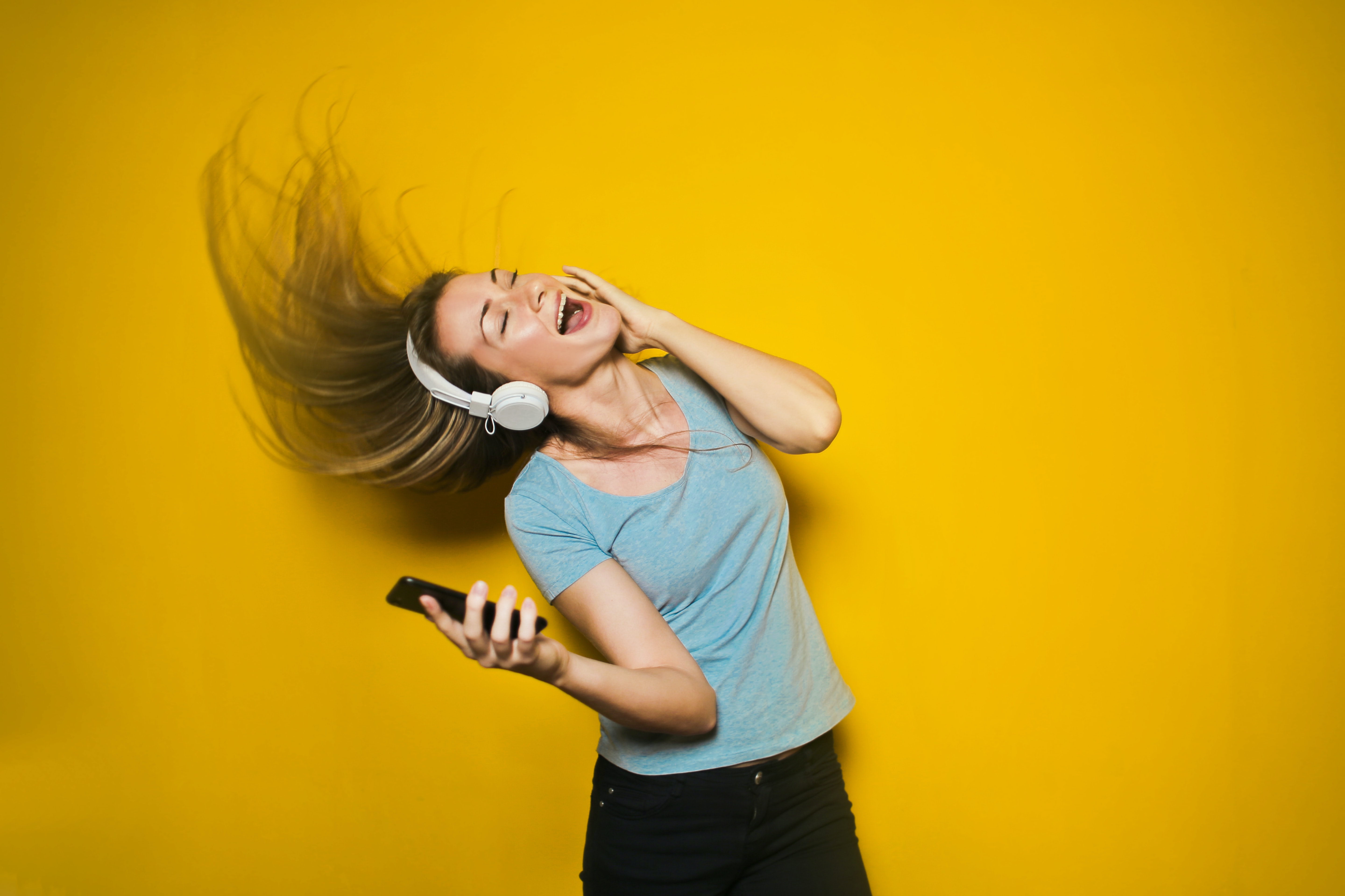 Image of a person listening to music