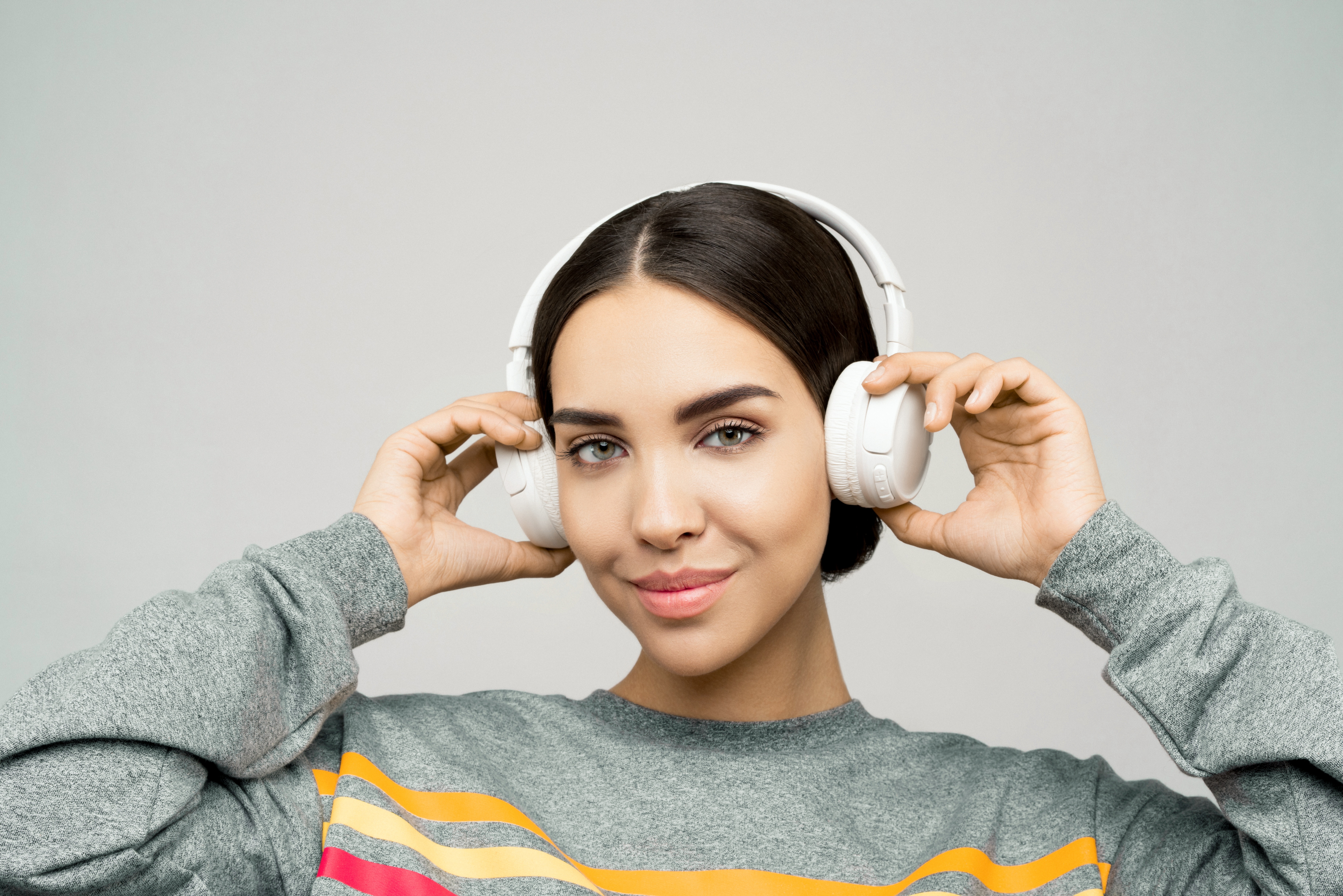 Image of a person listening to music